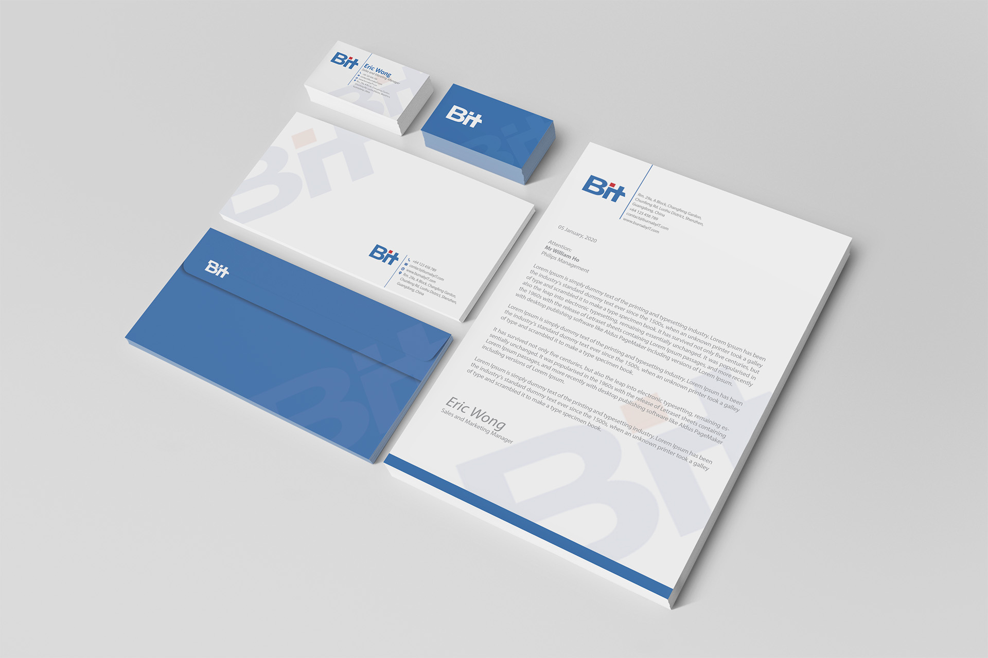 Mockup of BiT corporate stationary showing letterhead, envelopes (front and back) and name cards.